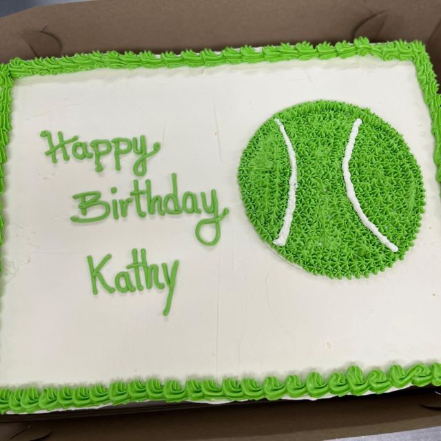 Bebop Cap and Baby Tennis Shoes on Round Cake – Tiffany's Bakery